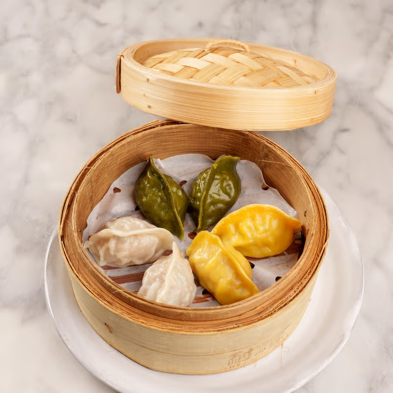 Chef's selection Dumplings & Buns - Six pieces of 3 Pork & 3 Chicken. Choice of steamed or pan fried. Served with Dumpling Sauce.